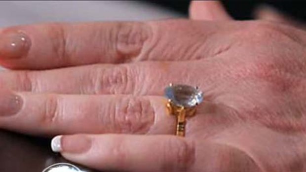 Wedding bells? . . . a diamond ring on Julia Gillard's finger raises speculation that the PM may be heading down the aisle.