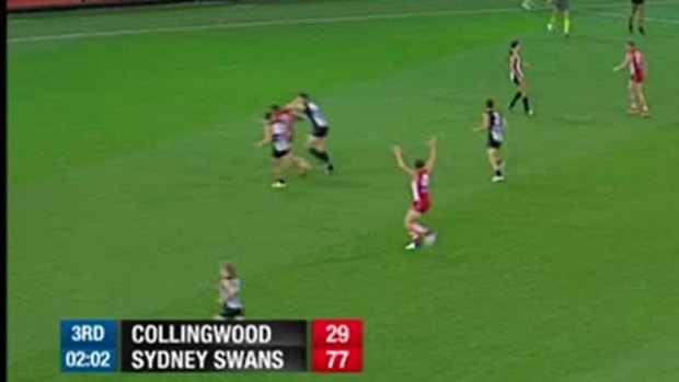 Collingwood's Darren Jolly's clumsy attempt at blocking Sydney's Ben McGlynn from leading in the teams' match at the MCG last Friday night.