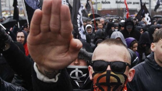 Russian nationalists attend a demonstration.