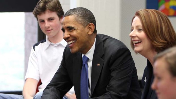 Barack Obama and Prime Minister Julia Gillard visit journalism students  at Campbell High School in Canberra today.  Year 9 student Harry Dalton is on the President's right.