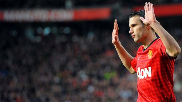 Hands up &#8230; Robin van Persie refuses to celebrate after scoring against his former club.