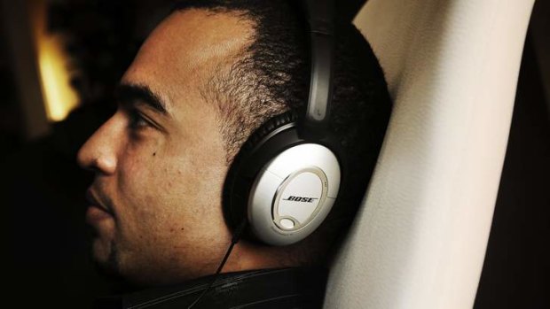 Ditch the crappy economy earbuds for a pair of noise-cancelling headphones.