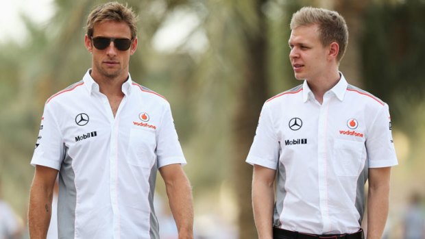 Kevin Magnussen, right, and would-be McLaren teammate Jenson Button.