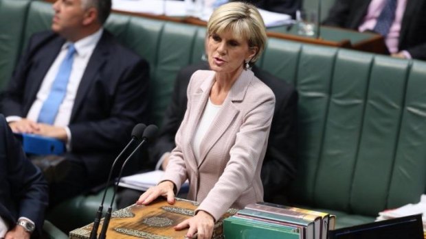 Foreign Minister Julie Bishop has told Coalition MPs Labor has "strapped itself" to the government on national security.