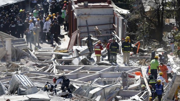 Emergency responders work search for survivors after gas tanker exploded, destroying a maternity hospital in Mexico City.