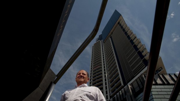 Mario Salvo from the Salvo Property Group in front of one of his developments - The Bank Apartments in Southbank, Melbourne.