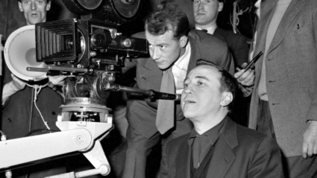 American Film Director Hal E Chester (crouching) is pictured directing the film "The Weapon" at Merton Park Studios  (Photo: Getty Images)