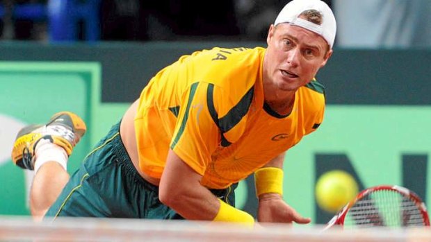 Flying start: Lleyton Hewitt defeated Lukasz Kubot in the opening rubber.