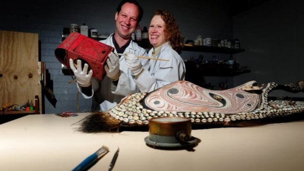 Conservators Andrew Pearce and Victoria Gill at their shop Endangered Heritage in Phillip.