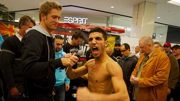 Billy Dib stirring up the crowd during the weigh-in for his fight against Jorge Lacierva of Mexico in July.