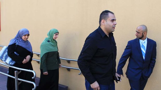 Rahma's family ... Hosayn El-Dennaoui, far right, and Alyaa El-Dennaoui, far left, leave the Coroner's Court.