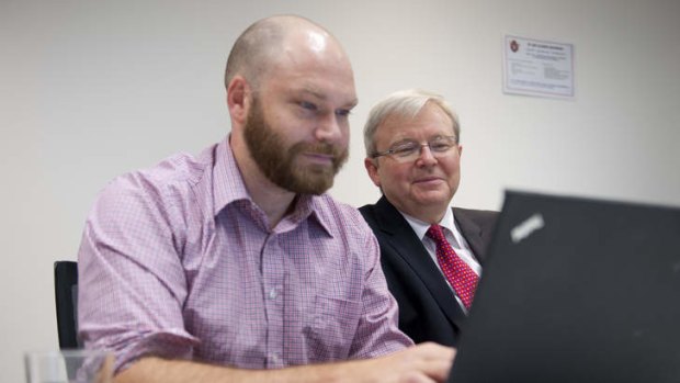 Brisbanetimes.com.au social media editor Dan Nancarrow types in the answers of Prime Minister Kevin Rudd as he responds to questions from the public during a live Q&A at the brisbanetimes.com.au office on Monday.