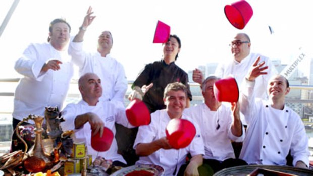 Practising the frypan flip ... from top left, Peter Gilmore, Neil Perry, Luke Nguyen and Somer Sivrioglu. Bottom: Mark Best, Sean Connolly, Peter Doyle and Brent Savage.