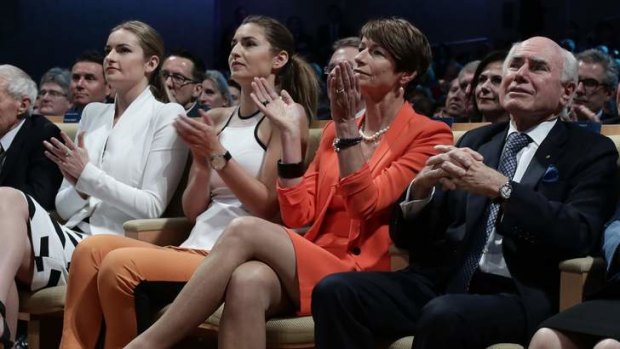 Tony Abbott's family sit in the front row with former PM John Howard at the Liberal Party campaign launch.