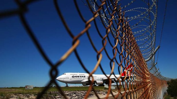 Stand by: Decision pending on government help for Qantas.
