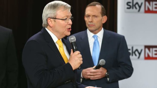Prime Minister Kevin Rudd and Opposition Leader Tony Abbott during the People's Forum at the Broncos Leagues Club in Brisbane.
