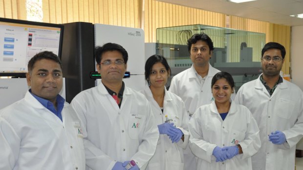 Professor Rajeev Varshney (left) with other peanut sequencing project researchers