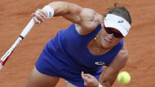 Going up: Sam Stosur during her straight sets win over Dominika Cibulkova that took her into the final 16.