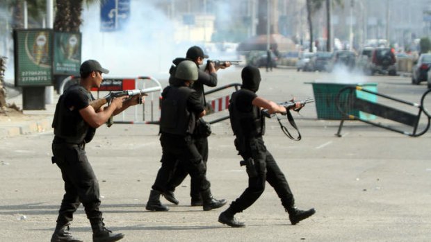 Riot police outside Cairo University.