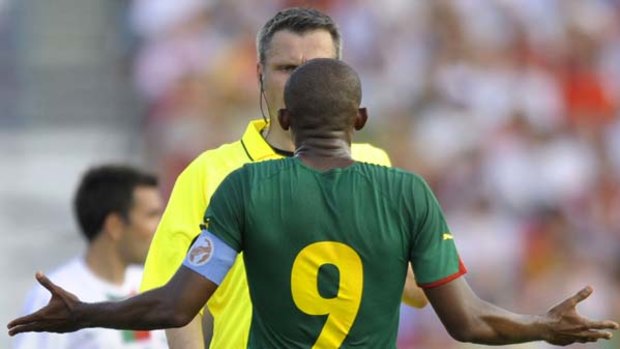 Sent off ... Samuel Eto'o argues with German referee Michael Weiner