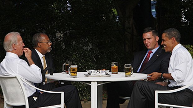 Peace talks ... Mr Obama puts things right over drinks on the lawn.