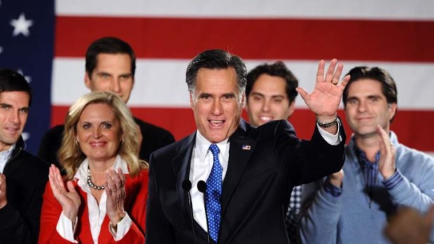 Poll position ...  Mitt Romney, wife Ann, and four of their five sons, after his caucus night rally in Iowa.
