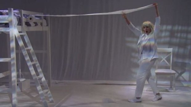 Lena Dunham in a weird interpretive dance to <i>Chandelier</i> with Sia in the bed.