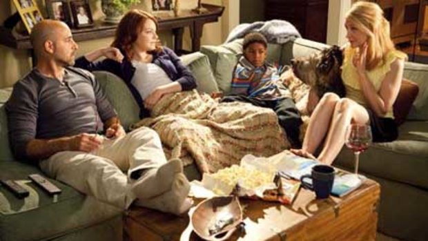 Emma Stone plays Olive (second from left) in Easy A.