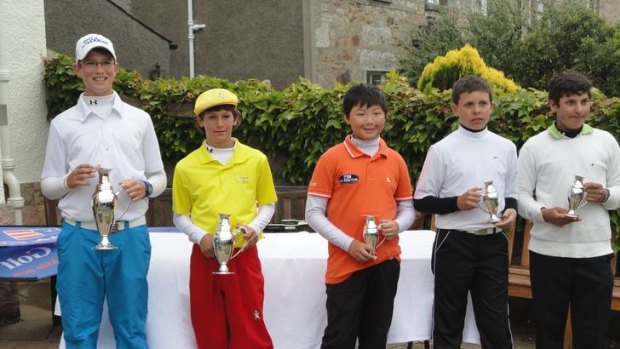 Josh Armstrong, left, towers over his opponents after winning the boys 12-year division of the Junior European Championship by seven strokes, from left, Charles Reiter (USA), Jerry Ji (Netherlands), Alexander Chapman (United Kingdom), and Felipe Ramirez (Colombia).