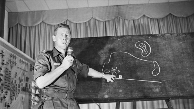 Major Harry Smith of Brisbane, Queensland briefing foreign press representatives on the battle of Long Tan in 1966 in Vietnam.