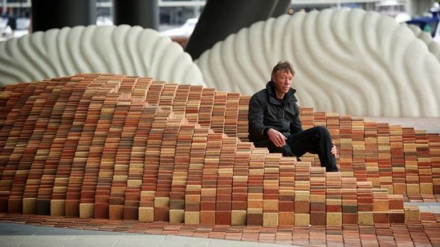 Natural flow: Mark Stoner at his installation <i>The River Runs through It</i>, which spreads from the western tip of Collins Street to the Docklands water's edge.