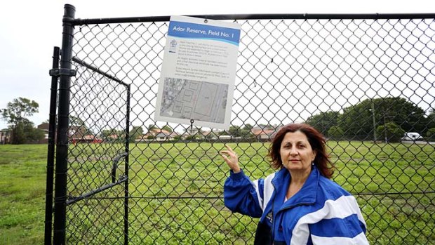 ''Disgusted'': Resident Mary Satti outside Ador Avenue Reserve.
