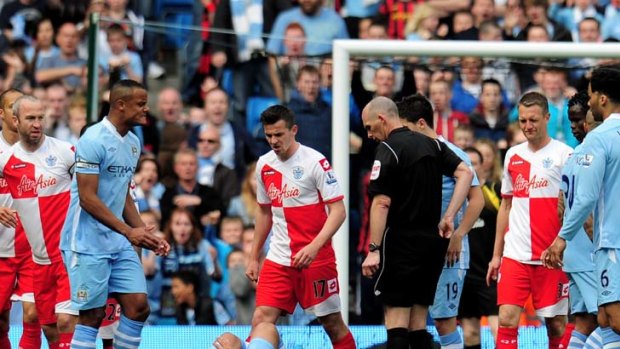 Demoted ... Joey Barton has lost the QPR captaincy for his actions in the match against Manchester City.