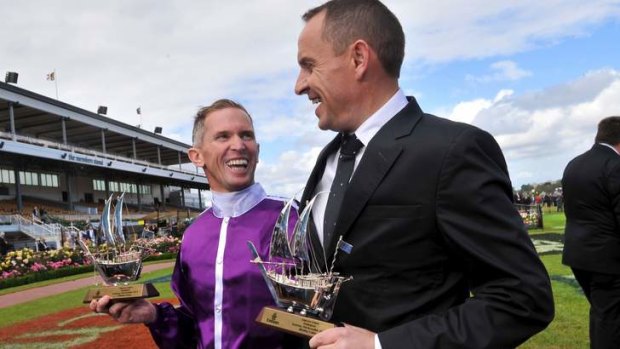 Class act: Boban's rider Glyn Schofield celebrates his Emirates Stakes win with trainer Chris Waller.