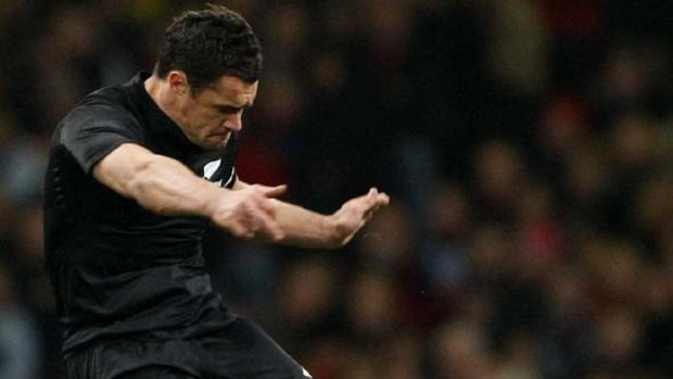 Dan Carter kicks a penalty goal against Wales to beat the world record of most points scored in test rugby.
