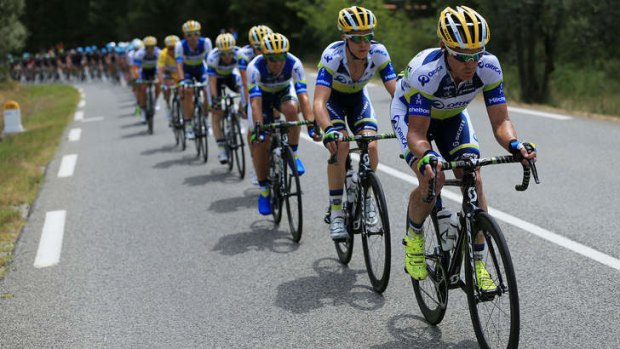 In the lead: Stuart O'Grady rides at the front of his Orica-GreenEDGE team in the Tour de France.