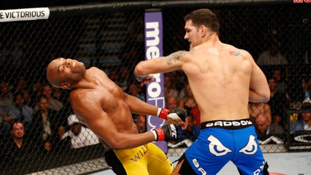 Chris Weidman knocks out Anderson Silva to win the UFC middleweight title.