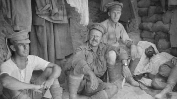 Australian soldiers rest in a dugout at Gallipoli.