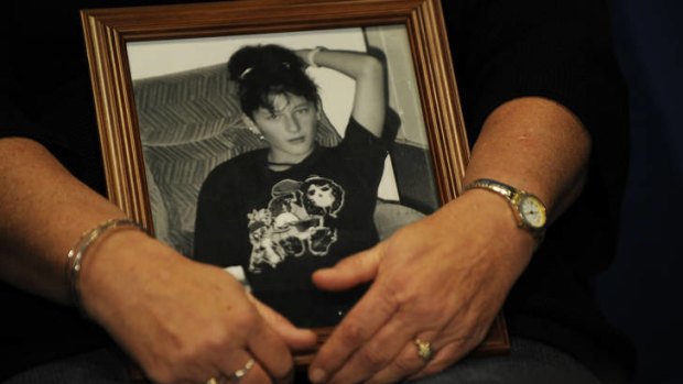 Jennifer Bird holds a picture of her daughter, Prue, who has been missing since 1992.