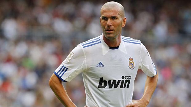 Tummies in: Real Madrid's sports director Zinedine Zidane has been giving weight loss tips to Karim Benzema.