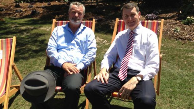 Wise Foundation executive director Alex McDonald and Lord Mayor Graham Quirk enjoy the deckchairs in the Botanic Gardens.