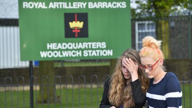 Mouners outside an army barracks near the scene of the killing of a British soldier.