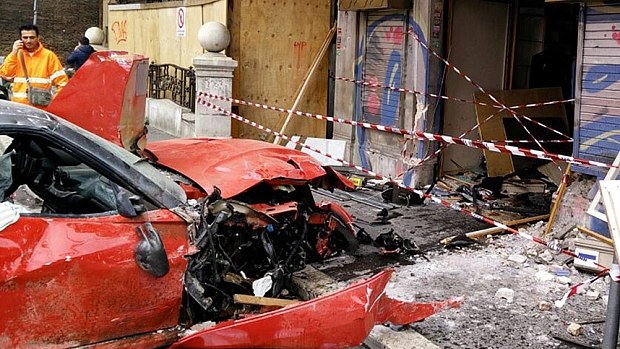 Instead of gently guiding the bright red Ferrari 599 GTO towards the Hotel Exedra, a mortified Roberto Cinti careered into a shop, trashing the car completely and badly damaging the shop front.