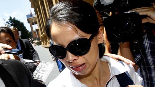 Sobbed ... Kathy Lin leaves the Supreme Court after her husband Robert Xie was refused bail.
