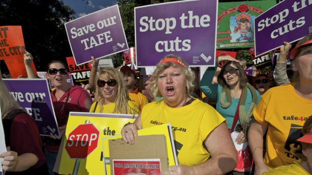 Grim outlook: Protesters at Treasury Gardens voice concerns about cuts to the TAFE sector.
