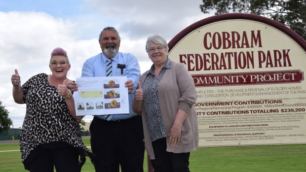 Peach plan: Cath Noonan and Liz Diamond from the Cobram Barooga Business and Tourism group with Moira Shire Mayor Gary Cleveland.