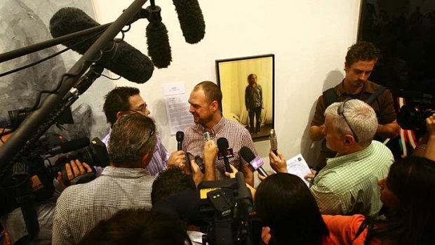 No contest ...  media gather around Sam Leach after he won last year's Archibald Prize.