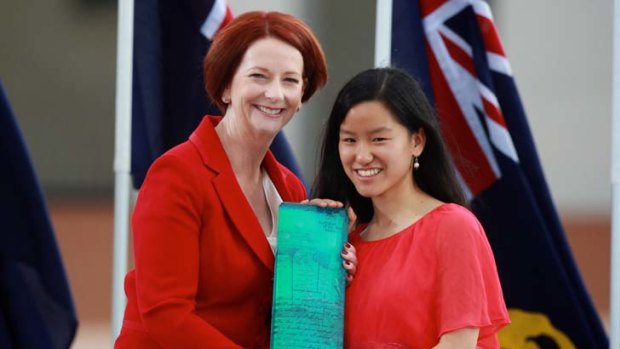 Young Australian of the Year, Marita Cheng, receives her award from Prime Minister Julia Gillard.