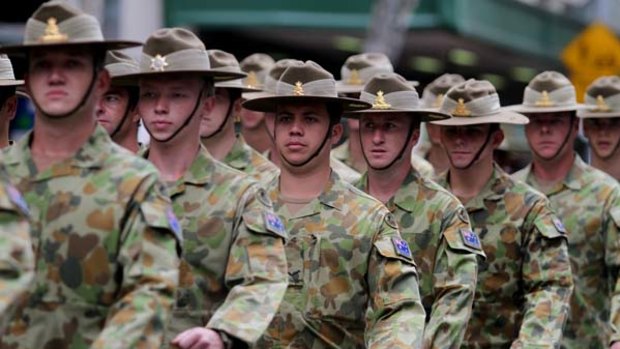 Personnel from the 7th Brigade march in Brisbane.
