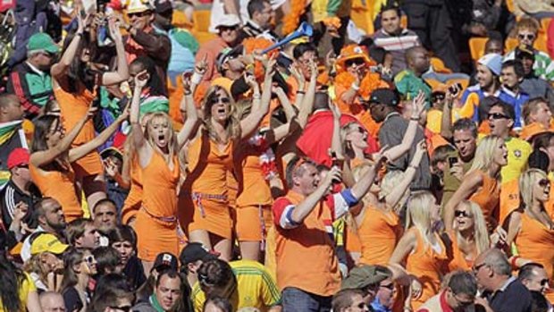 Some 36 women dressed up as Dutch supporters entered the stadium and stripped of their Dutch outfit to reveal the Orange miniskirt designed by Dutch beer brewer Bavaria.